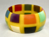 WT3 multicolor windowpane on bright yellow resin bangle